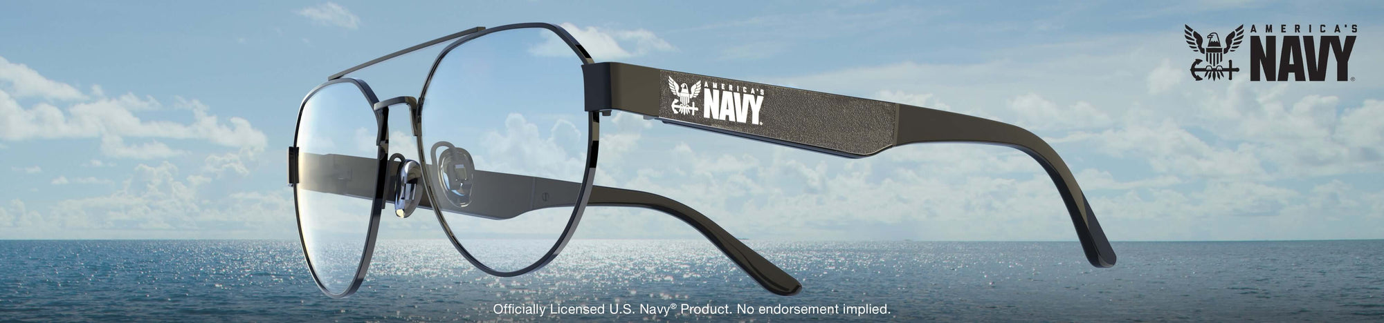 Glasses with a 'Navy' logo on the frame against a blue sky and ocean background