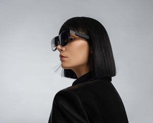 Woman wearing Xreal One glasses